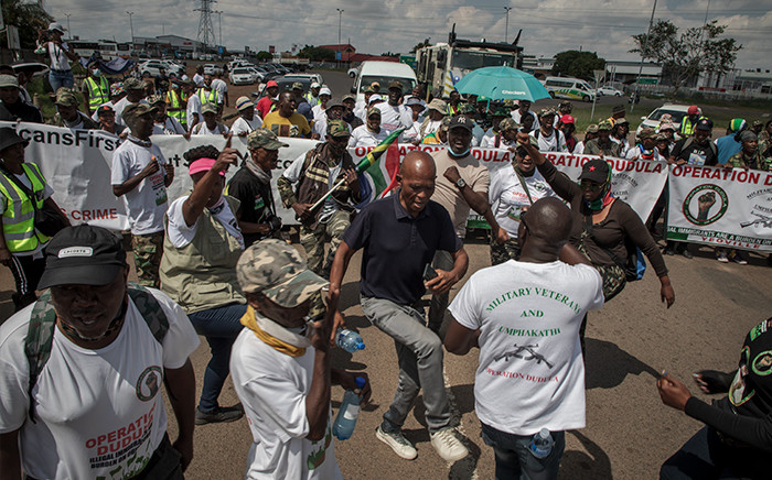 Operation Dudula members in Rosslyn, Pretoria, on Tuesday, 29 March 2022. Picture: Boikhutso Ntsoko/Eyewitness News