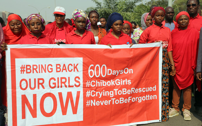 FILE: Members of the ‘Bring Back Our Girls’ movement march to press for the release of the missing schoolgirls kidnapped in 2014 from their school in Chibok by Islamist group Boko Haram, during a rally in Abuja in January 2016. Picture: AFP.