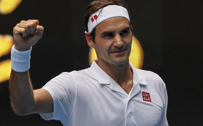 FILE: Switzerland's Roger Federer celebrates after victory over Britain's Daniel Evans in their men's singles match on day three of the Australian Open tennis tournament in Melbourne on 16 January 2019. Picture: AFP