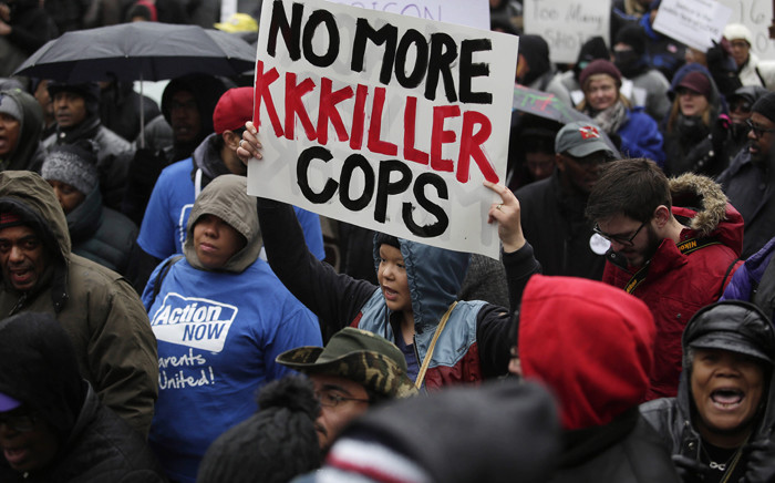 Demonstrators protest the shooting of Laquan McDonald along the Magnificent Mile 27 November, 2015 in Chicago, Illinois. Picture: AFP.