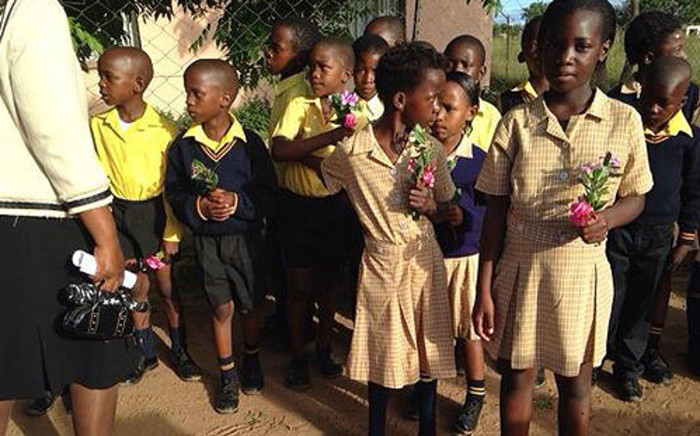 FILE: Michael Komape's classmates outside his house in Limpopo for his funeral service. Picture: Masego Rahlaga/EWN.