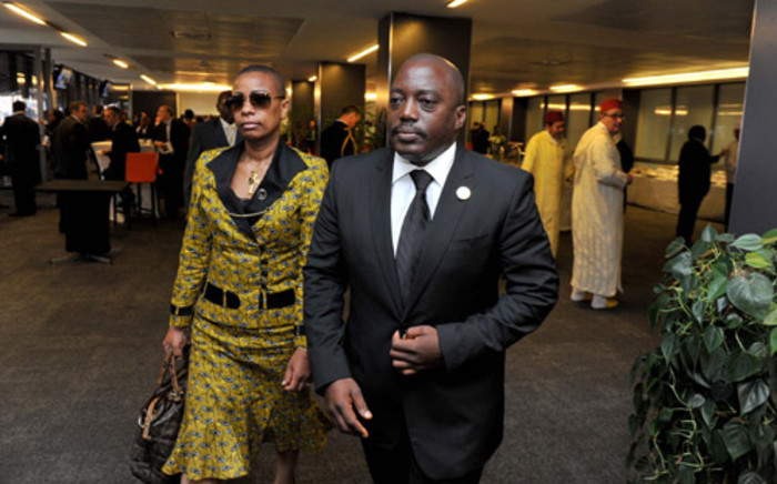 Democratic Republic of Congo President Joseph Kabila and his wife arriving at FNB Stadium ahead of Nelson Mandela memorial. PIcture: GCIS.