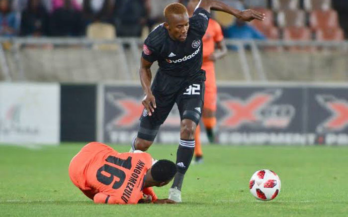 Orlando Pirates's Linda Mntambo battles with his Polokwane City opponent during their Absa Premiership match on 6 November 2018. Picture: @orlandopirates/Twitter