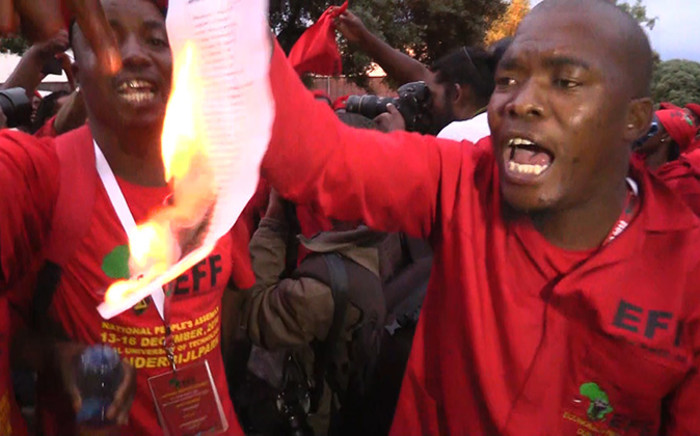 EFF members burn a list they allege was used to predetermine the nominations for the party's Central Command Team. Picture: Vumani Mkhize/EWN.