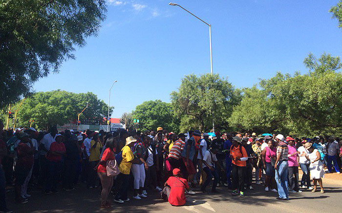 Members of the EFF student command attempted to prevent students from entering the TUT Pretoria west campus, but they pushed through with the help of the police. Picture: Barry Bateman/EWN.