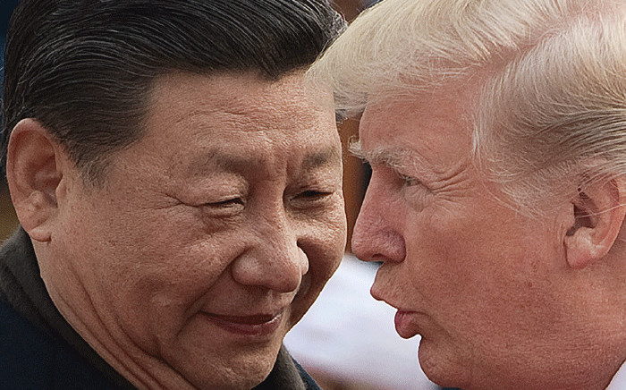 FILE: China’s President Xi Jinping (L) and US President Donald Trump. Picture: AFP.