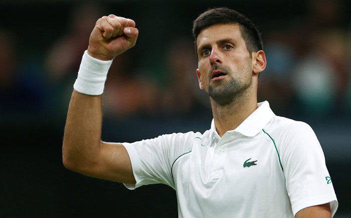 Serbia's Novak Djokovic reacts to breaking Netherlands' Tim van Rijthoven's serve during their round of 16 men's singles tennis match on the seventh day of the 2022 Wimbledon Championships at The All England Tennis Club in Wimbledon, southwest London, on 3 July 2022. Picture: Adrian DENNIS/AFP