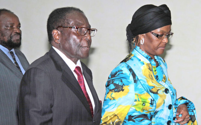 President of Zimbabwe Robert Mugabe and his wife Grace in Italy in 2011. Picture: EPA.