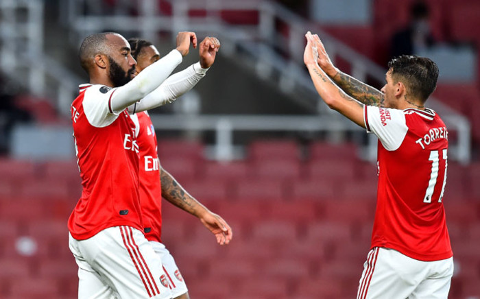Arsenal's Alexandre Lacazette (left) celebrates his goal against Liverpool in thei English Premier League match on 15 July 2020. Picture: @Arsenal/Twitter