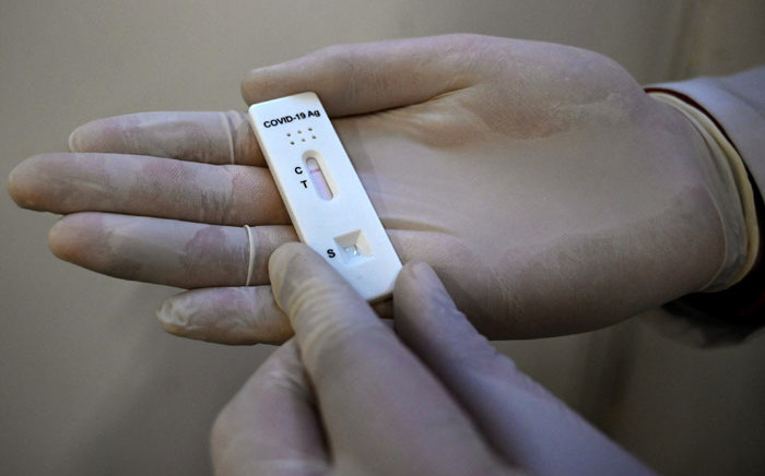 FILE: A view of a used rapid antigen test for the coronavirus disease (Covid-19) with negative result at a testing centre in a metro station in Moscow on 11 November 2021. Picture: Natalia Kolesnikova /AFP