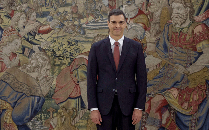 Spain's Prime Minister Pedro Sanchez smiles during a swearing-in ceremony at the Zarzuela Palace near Madrid on 2 June 2018. Picture: AFP.