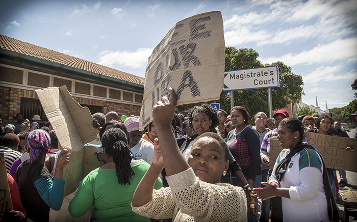 Masiphumelele residents gathered outside Simons Town Magistrates Court in support of community activist Lubabalo Vellem, who has been accused of murder after he allegedly assaulted a man in his community who later died of his injuries. Picture: Thomas Holder/EWN