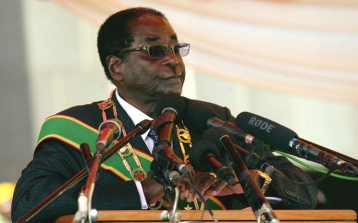 Zimbabwe President Robert Mugabe delivers a speech at the National Heroes Acre in Harare on 12 August 2013 during Heroes Day celebrations. Picture: Jekesai Njikizana/AFP