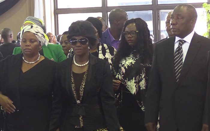 Deputy President Cyril Ramaphosa walks with Chabane family members during the late Minister Collins Chabane's memorial service in Pretoria. Picture: Vumani Mkhize/EWN.