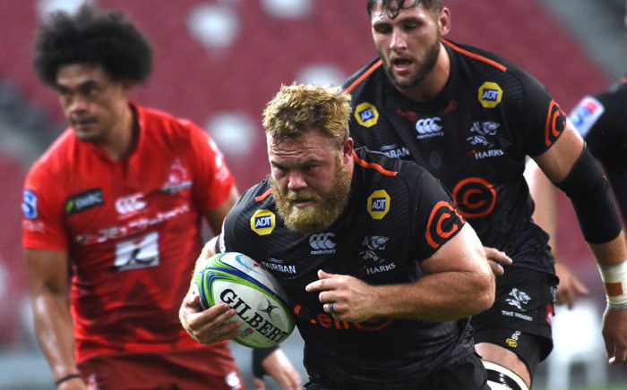 The Sharks' Akker van der Merwe (C) runs with the ball during the Super Rugby match against the Sunwolves in Singapore on 16 February 2019. Picture: AFP