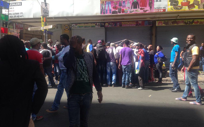 Many South Africans gathered in Johannesburg CBD to show their support to foreign-owned shops folLowing the spate of attacks on foreign nationals on 15 April 2015. Picture: Mia Lindeque/EWN.