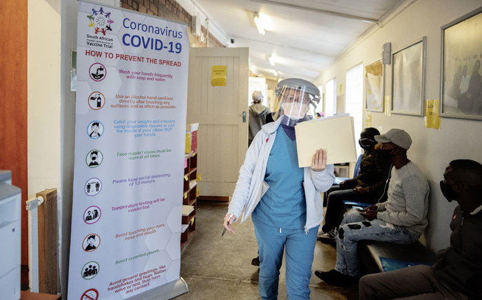 FILE: A doctor walks in the Respiratory & Meningeal Pathogens Research Unit (RMPRU) at Chris Hani Baragwanath Hospital in Soweto on 14 July 2020. Picture: AFP.