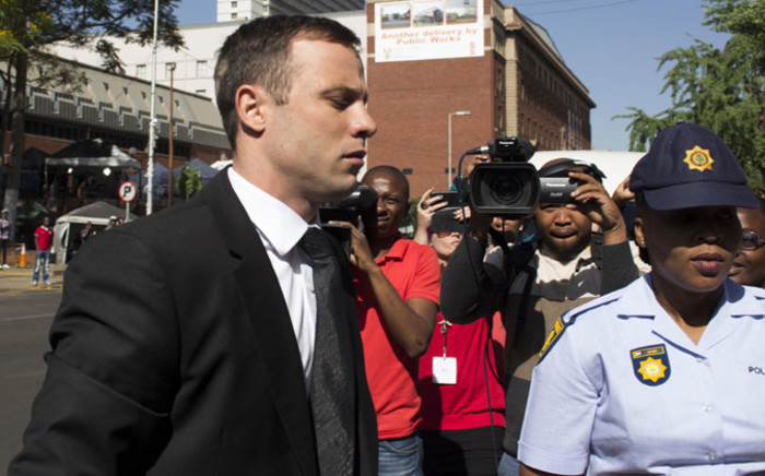Oscar Pistorius arrives at the High Court in Pretoria ahead of his sentencing on 17 October 2014. Picture: Christa Eybers/EWN.