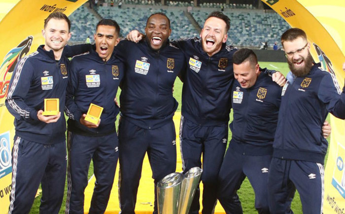 Cape Town City FC coach Benni McCarthy (third left) celebrates winning the 2018 MTN8 final with his management team. Picture: @CapeTownCityFC/Twitter