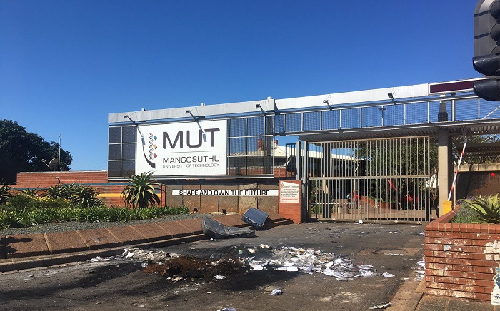 Students blocked the entrance to the Mangosuthu University of Technology during a protest led by the EFF Student Command over registration and funding on Thursday, 8 April 2021. Picture: Nkosikhona Duma/Eyewitness News.