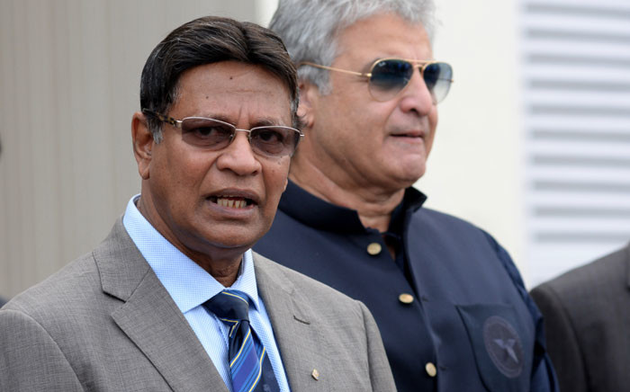 FILE: A high-level security delegation member of Sri Lanka Cricket (SLC) secretary Mohan De Silva (L) speaks to media with a Pakistan cricket official after visiting the Gaddafi Cricket Stadium to assess the possibility of staging two cricket test matches, in Lahore on 8 August 2019. Picture: AFP