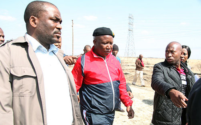 Expelled ANCYL leader Julius Malema visited striking Lonmin mineworkers in Marikana in the North West on 18 August 2012. Picture: Taurai Maduna/EWN.