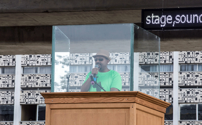 Ethiopia Prime Minister Abiy Ahmed delivers a speech behind a glass during a rally on Meskel Square in Addis Ababa on 23 June 2018. Picture: AFP
