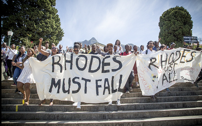 FILE: UCT students march down the stairs in front of the Rhodes statue on the campus. Using the slogan "Rhodes Must Fall" they are demanding it be taken down as it represents institutional racism. Picture: Thomas Holder/EWN.