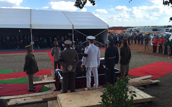 Various members of the South African National Defence force stand by as the coffin of late Public Service and Administration Minister, Collins Chabane, was lowered into the ground at a cemetery in the Xikundu village. Picture: Reinart Toerien/EWN.