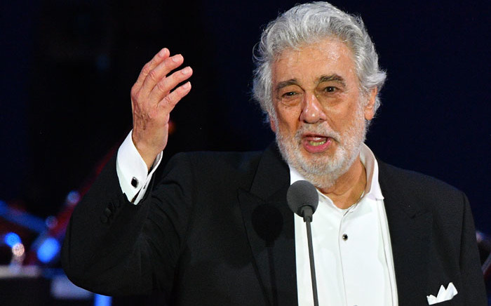 FILE: Spanish tenor Placido Domingo gestures as he performs during his concert in the newly inaugurated sports and culture centre 'St Gellert Forum' in Szeged, southern Hungary, on 28 August 2019. Picture: AFP