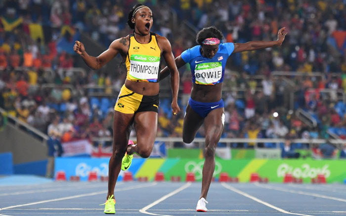 Jamaica's Elaine Thompson (L) reacts as she crosses the finish line next to bronze medallist USA's Tori Bowie to win the Women's 200m Final at the Rio 2016 Olympic Games at the Olympic Stadium in Rio de Janeiro on August 17, 2016. Picture: AFP