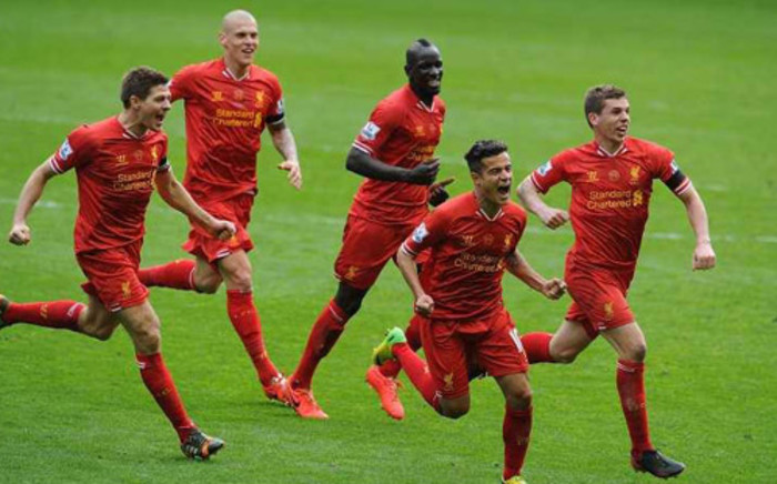 Liverpool's Philippe Coutinho celebrates his goal with team mates against Manchester City in the English Premier League on 13 April 2014. Liverpool won the match 3-2. Picture: Facebook.