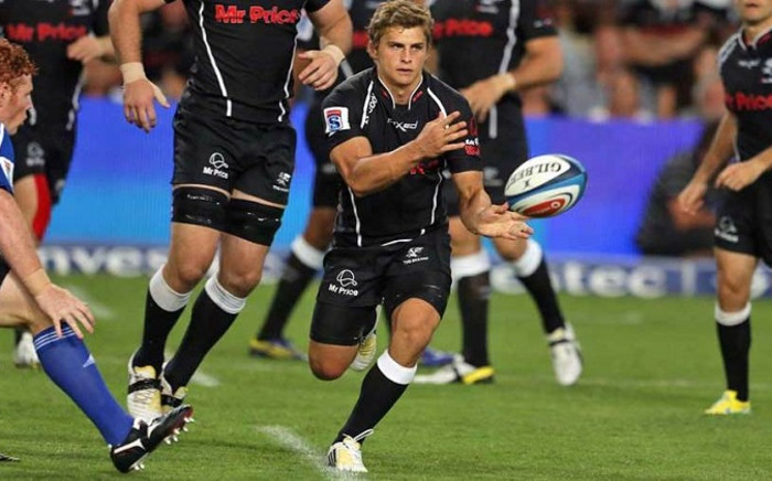 FILE: Sharks and Springbok player Pat Lambie sends a pass down the line. Picture: Sharks Rugby Facebook Page.