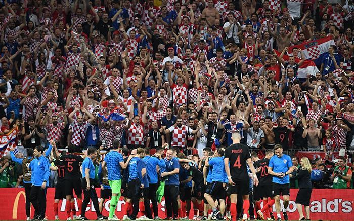 Croatia's players celebrate with the fans after their win in the Russia 2018 World Cup semi-final football match between Croatia and England at the Luzhniki Stadium in Moscow on July 11, 2018.  Picture: AFP