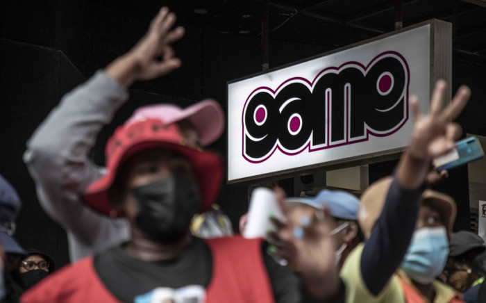 FILE: Striking Massmart employees affiliated to Saccawu march to a Game store in the Joburg CBD on 26 November 2021. Picture: Abigail Javier/Eyewitness News
