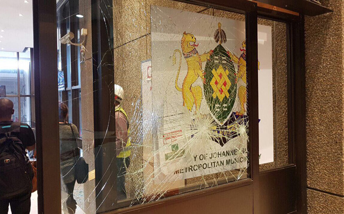Property was damaged when violence broke out at the Johannesburg City Council. Picture: Cllr Sarah Wissler via Twitter.