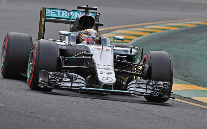 FILE: Mercedes AMG Petronas F1 Team's British driver Lewis Hamilton powers through a corner during qualifying for the Formula One Australian Grand Prix in Melbourne on 19 March 2016. Picture: AFP.