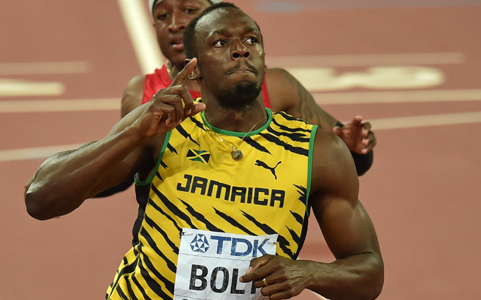 FILE: Jamaica's Usain Bolt celebrates winning the final of the men's 100m at the 2015 IAAF World Championships at the "Bird's Nest" National Stadium in Beijing on 23 August, 2015. Picture: AFP