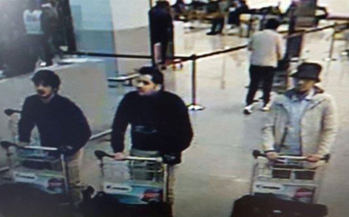FILE: A picture released on 22 March, 2016 by the belgian federal police on demand of the Federal prosecutor shows a screengrab of the airport CCTV camera showing suspects of this morning's attacks at Brussels Airport, in Zaventem. Picture: AFP.