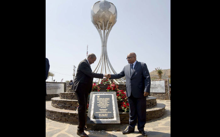 President Jacob Zuma and North West Premier Supra Mahumapelo stand before the Zuma Capture site monument unveiled in Groot Marico on 01 October 2017. Picture: GCIS.