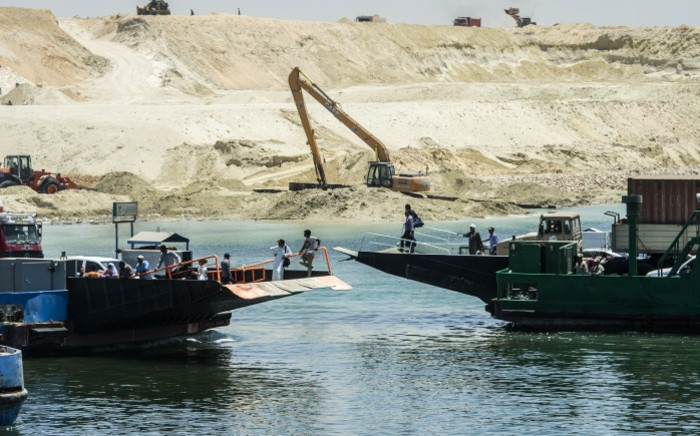 A picture taken on 29 July 2015 shows ships and boats at the new Suez Canal in the Egyptian port city of Ismailia, east of Cairo. Picture: AFP.