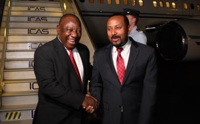 President Cyril Ramaphosa welcomed by Ethiopian Prime Minister Abiy Ahmed upon his arrival in Addis Ababa for the 33rd AU Summit. Picture: Twitter/Presidency
