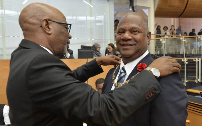 Dan Plato is presented with the City of Cape Town's mayoral chain of office. Picture: @CityofCT/Twitter