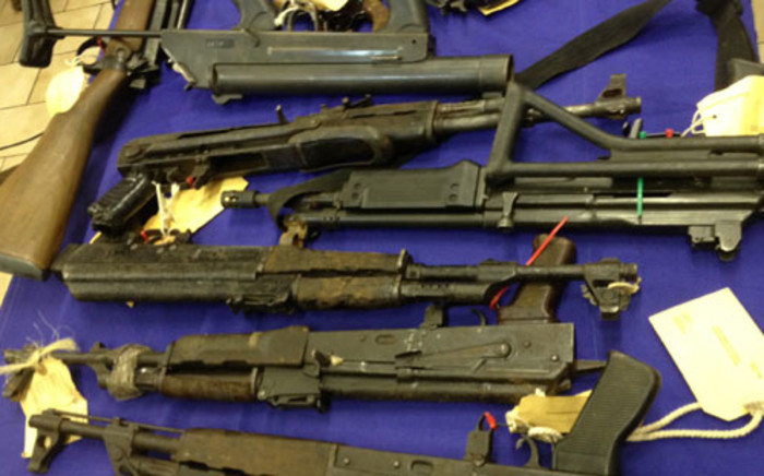Firearms confiscated by police are displayed. Picture: Werner Beukes/SAPA