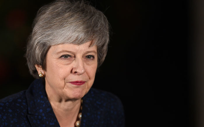 Britain's Prime Minister Theresa May makes a statement outside 10 Downing Street in central London after winning a confidence vote on 12 December 2018. Picture: AFP