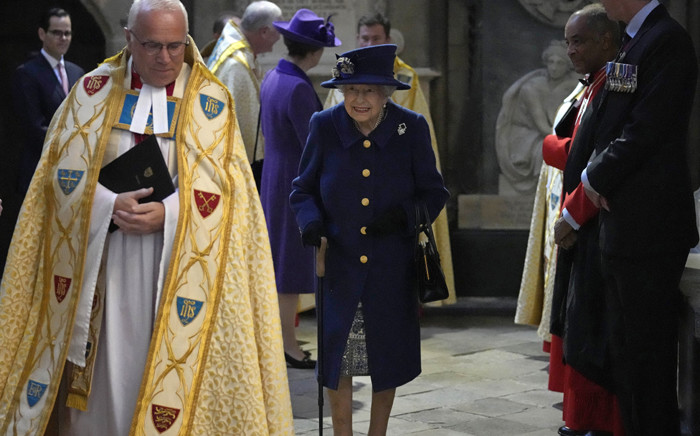 Britain's Queen Elizabeth II smiles as she arrives to attend a Service of Thanksgiving to mark the Centenary of the Royal British Legion at Westminster Abbey in London on 12 October 2021. Picture: Frank Augstein/POOL/AFP