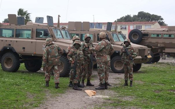 SANDF soldiers on patrol in Hanover Park. The military has released their soldiers to help stabilise gang hot-spots, while law enforcement agencies conducted raids in the area. Picture: Bertram Malgas/Eyewitness News