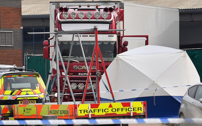 A lorry, believed to have originated from Bulgaria, and found to be containing 39 dead bodies, is pictured inside a Police cordon at Waterglade Industrial Park in Grays, east of London, on 23 October 2019. Picture: AFP