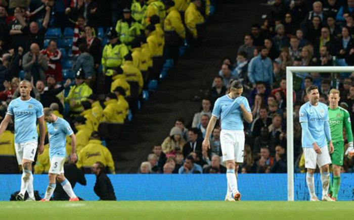 Visibly frustrated Manchester City players walk away after their 2-2 draw with Sunderland in the English Premier League on 16 April 2014. Picture: Facebook.