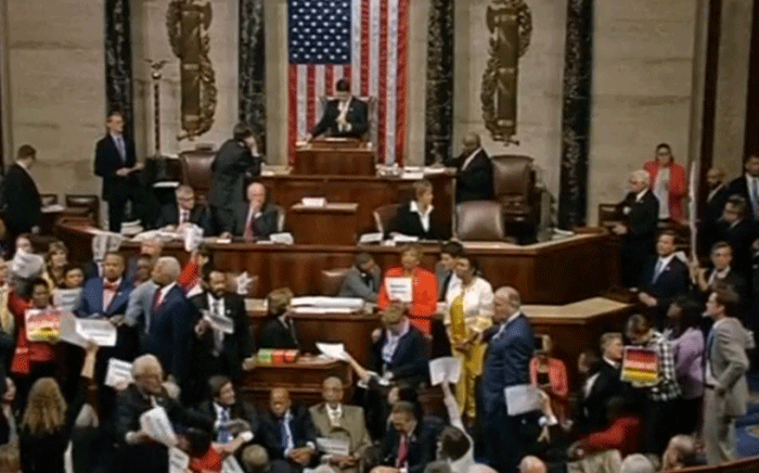 Democrats and Republicans in a stand-off during a session in the US House of Representatives. Screengrab via Reuters.